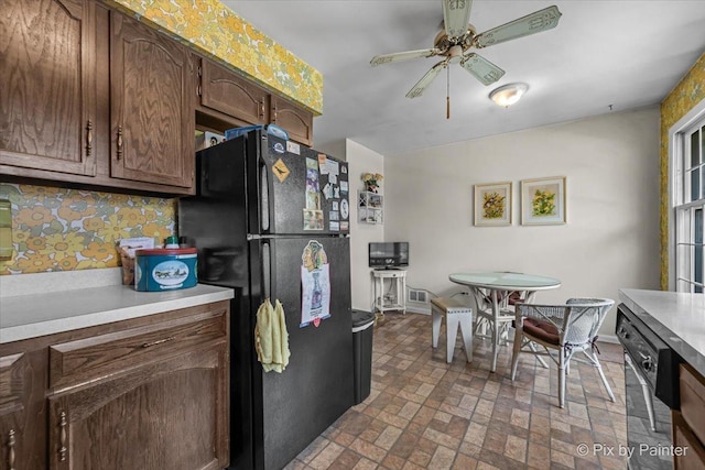 442 Kings Way, Mundelein, IL 60060 - kitchen featuring freestanding refrigerator, a ceiling fan, light countertops, dishwasher, and brick patterned floors