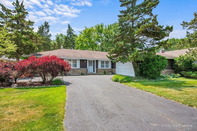 442 Kings Way, Mundelein, IL 60060 - view of front of property with driveway, an attached garage, a front yard, and stone siding