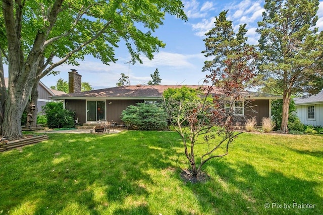 442 Kings Way, Mundelein, IL 60060 - rear view of house featuring a yard, a chimney, and a patio