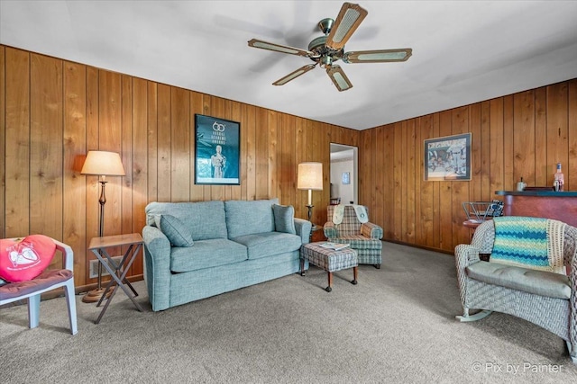 442 Kings Way, Mundelein, IL 60060 - living area featuring carpet floors, a ceiling fan, and wood walls