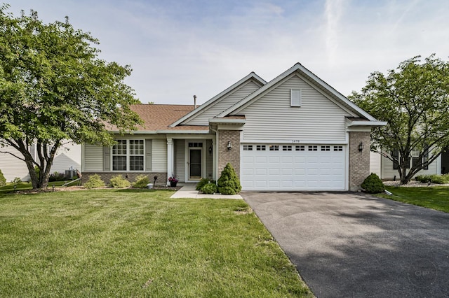 1478 W Flint Ln, Romeoville, IL 60446 - single story home with brick siding, driveway, a front yard, and an attached garage