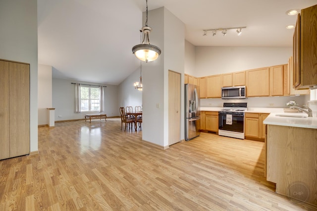 1478 W Flint Ln, Romeoville, IL 60446 - kitchen featuring stainless steel appliances, light brown cabinetry, light countertops, high vaulted ceiling, and light wood-style floors
