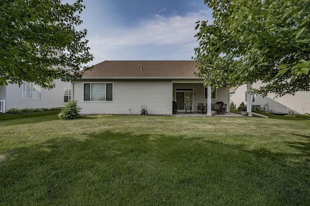 1478 W Flint Ln, Romeoville, IL 60446 - rear view of property with a patio area, a lawn, and roof with shingles