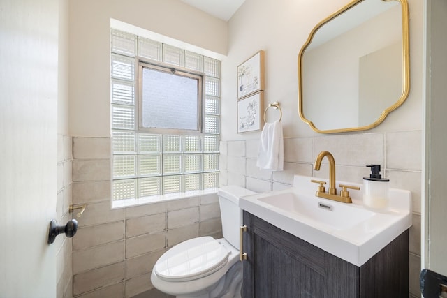 9210 S Mozart Ave, Evergreen Park, IL 60805 - half bathroom featuring tile walls, vanity, and wainscoting
