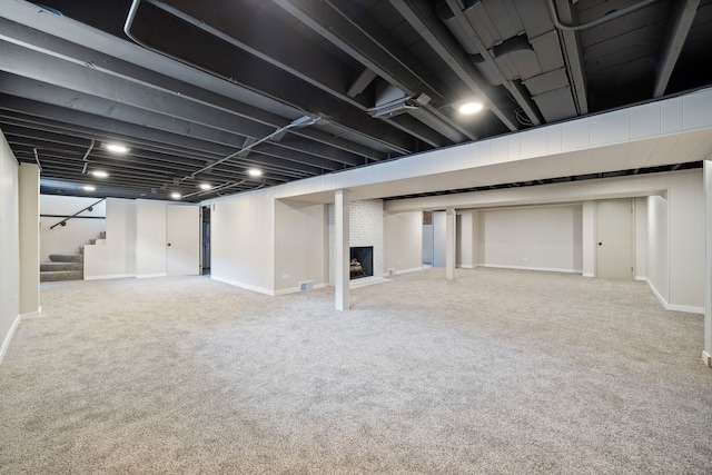 9210 S Mozart Ave, Evergreen Park, IL 60805 - finished basement featuring stairway, carpet floors, and a brick fireplace