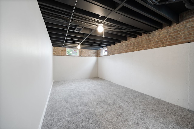 9210 S Mozart Ave, Evergreen Park, IL 60805 - below grade area with brick wall and carpet flooring