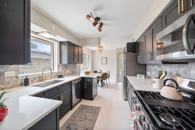 9210 S Mozart Ave, Evergreen Park, IL 60805 - kitchen with appliances with stainless steel finishes, backsplash, and plenty of natural light