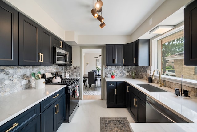 9210 S Mozart Ave, Evergreen Park, IL 60805 - kitchen with stainless steel appliances, light countertops, and tasteful backsplash