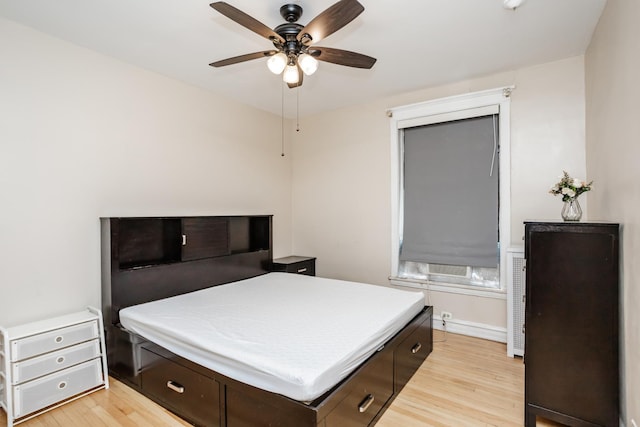5142 S Greenwood Ave Unit 1, Chicago, IL 60615 - bedroom with light wood-style floors and a ceiling fan
