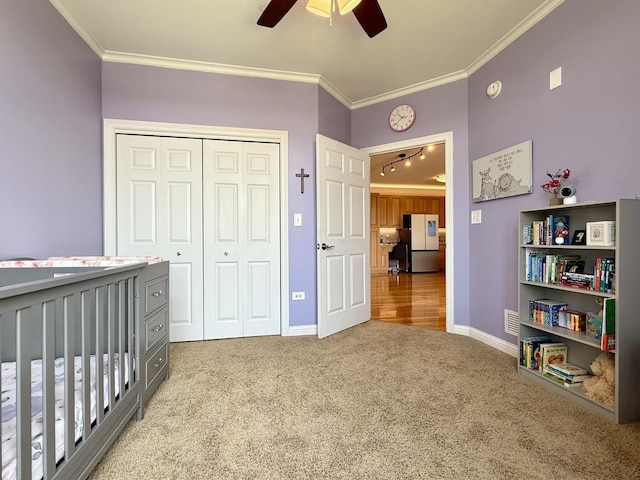 160 S River St Unit 204, Aurora, IL 60506 - carpeted bedroom with crown molding, freestanding refrigerator, a closet, and ceiling fan