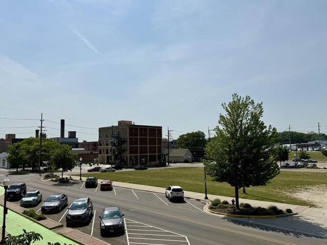 160 S River St Unit 204, Aurora, IL 60506 - view of asphalt road with curbs and sidewalks