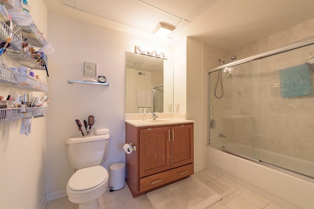 1919 S Michigan Ave Unit 412, Chicago, IL 60616 - full bathroom featuring tile patterned flooring, vanity, and shower / bath combination with glass door
