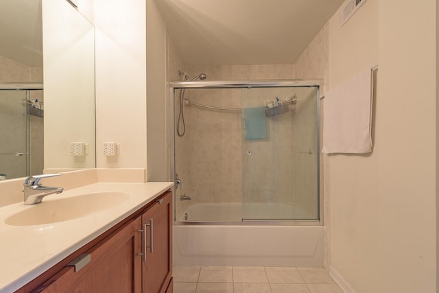 1919 S Michigan Ave Unit 412, Chicago, IL 60616 - bathroom featuring tile patterned floors, vanity, and shower / bath combination with glass door