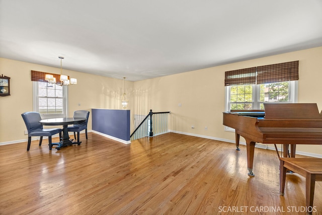 1006 Britta Ln, Geneva, IL 60134 - dining space featuring healthy amount of natural light, a chandelier, and light wood-style floors