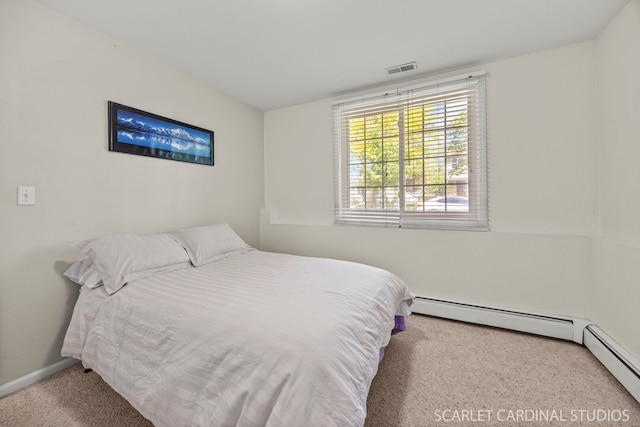 1006 Britta Ln, Geneva, IL 60134 - bedroom featuring carpet floors and a baseboard radiator