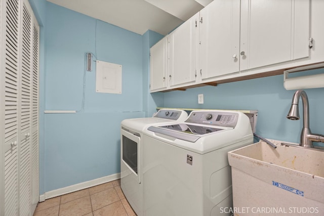 1006 Britta Ln, Geneva, IL 60134 - laundry area featuring electric panel, cabinet space, separate washer and dryer, and light tile patterned floors