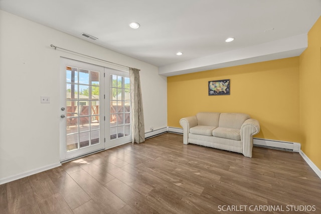 1006 Britta Ln, Geneva, IL 60134 - living area with wood finished floors, recessed lighting, and baseboard heating