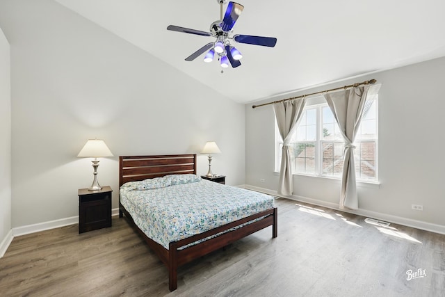 1272 Georgetown Way, Vernon Hills, IL 60061 - bedroom with wood finished floors, vaulted ceiling, and a ceiling fan