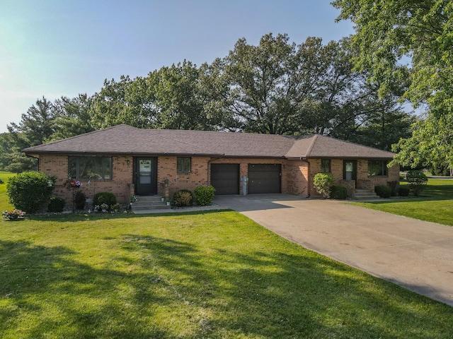 400-02 S Washington St, Braidwood, IL 60408 - view of front of house with an attached garage, brick siding, a front yard, concrete driveway, and a shingled roof