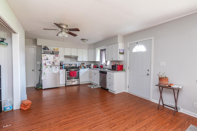 400-02 S Washington St, Braidwood, IL 60408 - kitchen with stainless steel appliances, ceiling fan, dark wood-type flooring, and under cabinet range hood