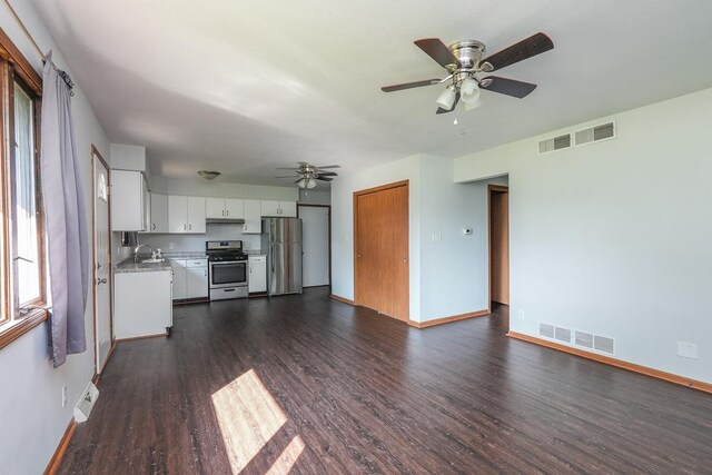 400-02 S Washington St, Braidwood, IL 60408 - unfurnished living room featuring dark wood-type flooring and ceiling fan