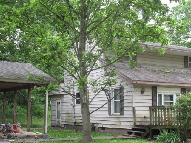 2238 Oakwood Ave, Danville, IL 61832 - view of home's exterior with a wooden deck