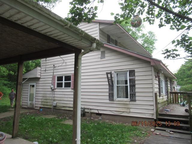 2238 Oakwood Ave, Danville, IL 61832 - view of property exterior with a wooden deck
