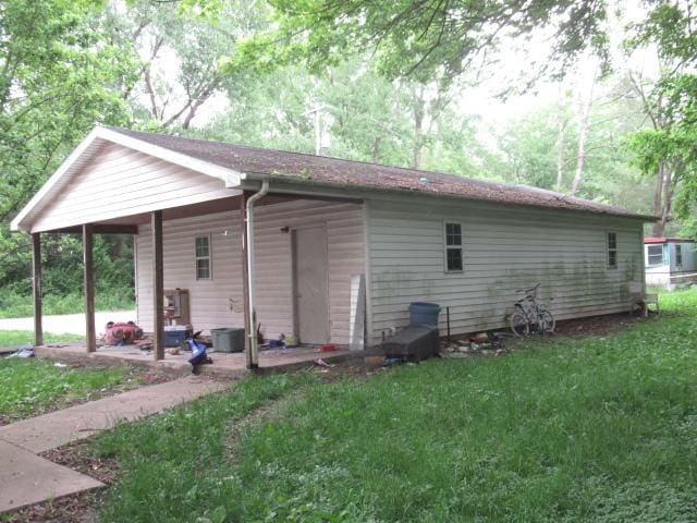 2238 Oakwood Ave, Danville, IL 61832 - view of home's exterior with a lawn