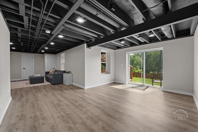 340 Hamilton Rd, Saint Charles, IL 60175 - unfurnished living room with wood finished floors and baseboards