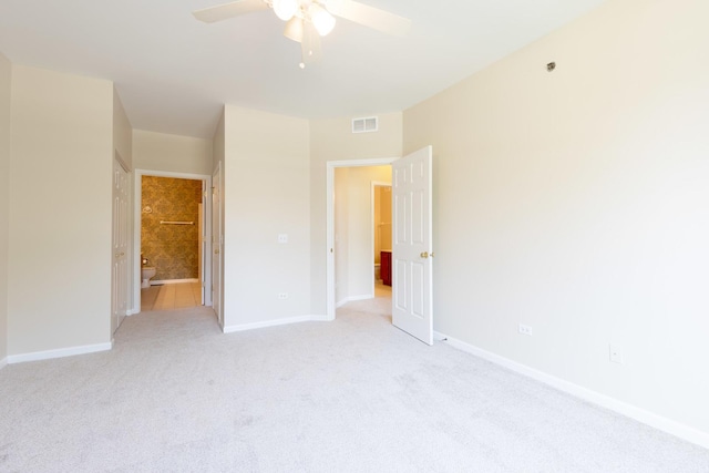 8126 Concord Ln Unit A, Justice, IL 60458 - unfurnished bedroom featuring light colored carpet and a ceiling fan