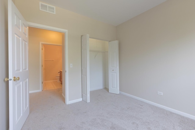 8126 Concord Ln Unit A, Justice, IL 60458 - unfurnished bedroom with light carpet and a closet