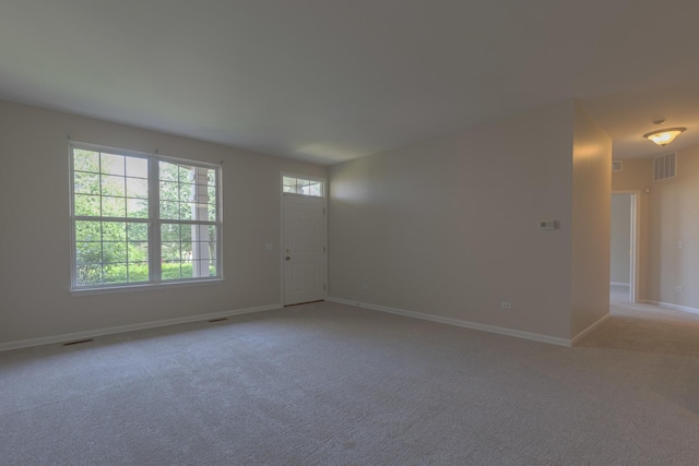 8126 Concord Ln Unit A, Justice, IL 60458 - unfurnished room with light carpet and baseboards