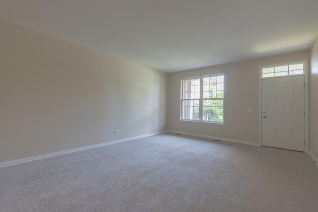 8126 Concord Ln Unit A, Justice, IL 60458 - entryway featuring plenty of natural light and light colored carpet