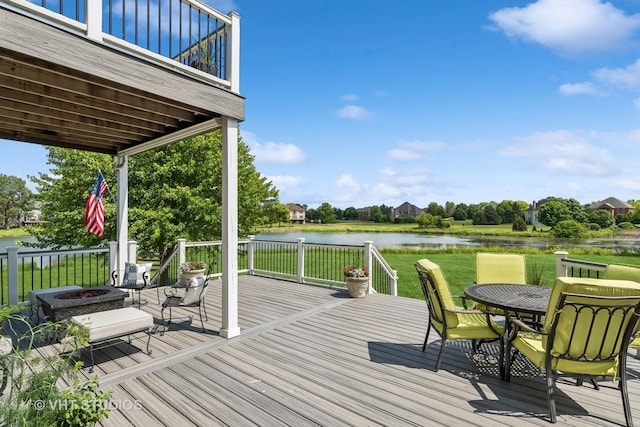 2 E Prairie Ct, Hawthorn Woods, IL 60047 - deck with a fire pit, a water view, a yard, and outdoor dining space