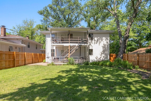 206-208 N Fremont St, Naperville, IL 60540 - rear view of house featuring stairway, a fenced backyard, and a deck