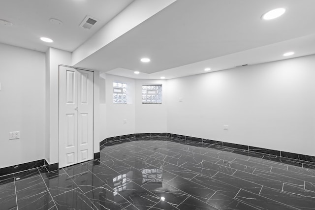 6920 S Laflin St, Chicago, IL 60636 - empty room with recessed lighting and dark marble finish flooring