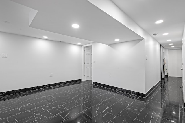 6920 S Laflin St, Chicago, IL 60636 - empty room featuring recessed lighting and dark marble finish floors