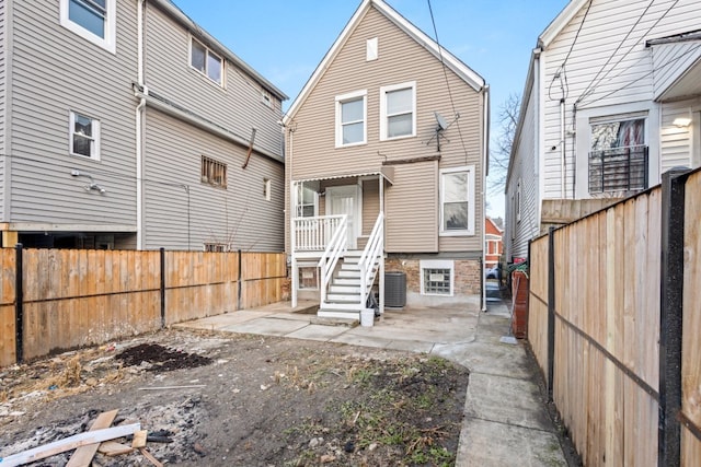 6920 S Laflin St, Chicago, IL 60636 - back of house with a fenced backyard and a patio area