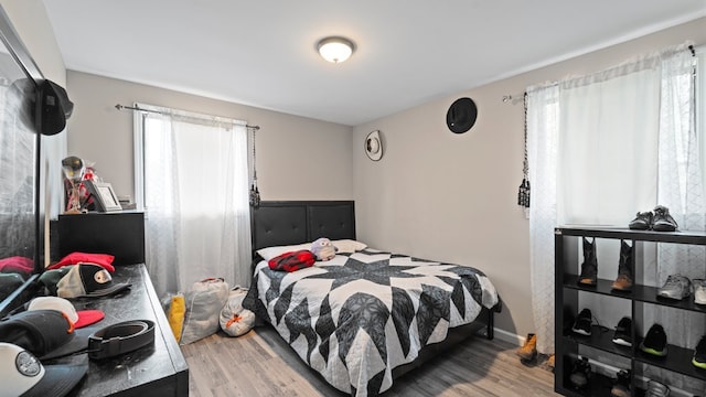 36 Monee Rd, Park Forest, IL 60466 - bedroom with multiple windows and light wood-type flooring