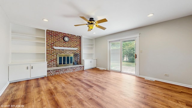 4265 Portage Ln, Hoffman Estates, IL 60192 - unfurnished living room with a ceiling fan, wood finished floors, built in features, a brick fireplace, and recessed lighting