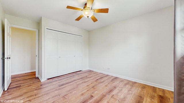 4265 Portage Ln, Hoffman Estates, IL 60192 - unfurnished bedroom featuring light wood-style flooring, a closet, and ceiling fan