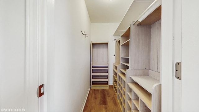 4265 Portage Ln, Hoffman Estates, IL 60192 - walk in closet featuring dark wood-type flooring
