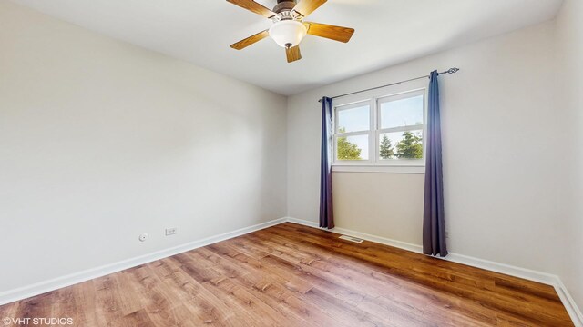 4265 Portage Ln, Hoffman Estates, IL 60192 - unfurnished room with light wood-type flooring and ceiling fan