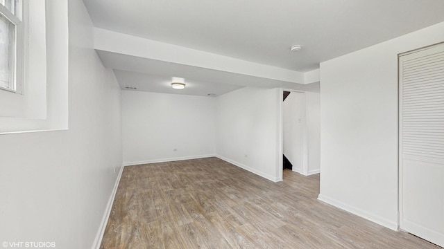 22201 Windsor Ct, Richton Park, IL 60471 - finished below grade area with light wood-style floors and baseboards