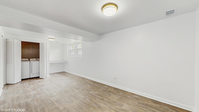 22201 Windsor Ct, Richton Park, IL 60471 - empty room with independent washer and dryer and light wood-type flooring