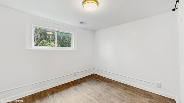 22201 Windsor Ct, Richton Park, IL 60471 - spare room with dark wood-style flooring and baseboards