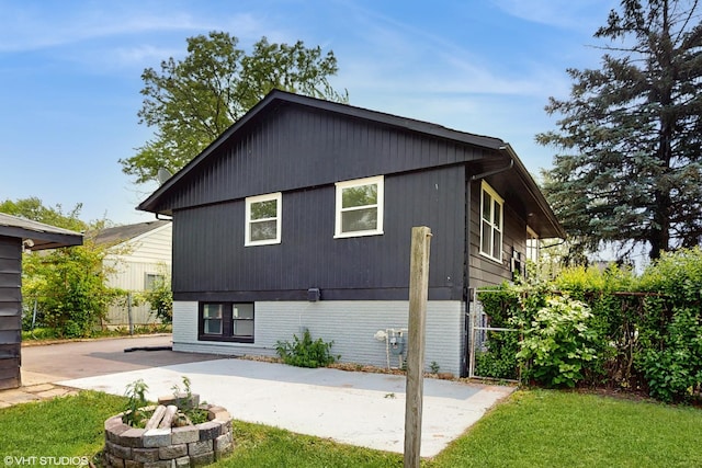 22201 Windsor Ct, Richton Park, IL 60471 - rear view of house featuring a patio and brick siding