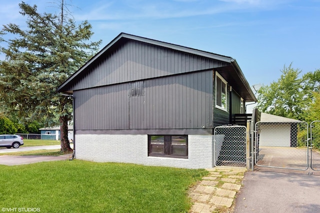 22201 Windsor Ct, Richton Park, IL 60471 - view of side of home with a gate and brick siding