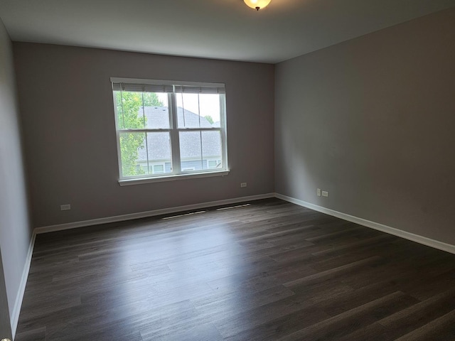3169 Pearl St, Elgin, IL 60124 - empty room with dark wood-style floors