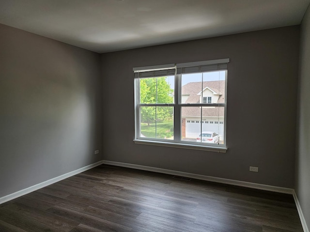 3169 Pearl St, Elgin, IL 60124 - spare room with dark wood-type flooring